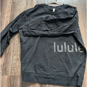 Black LULULEMON pull over sweatshirt
